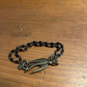 Black Beaded Bracelet with Bird Charm